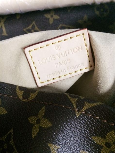 louis vuitton cowhide leather man made interior lining